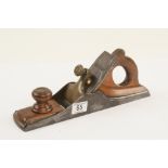 A steel panel plane with brass lever. An attractive plane that has had a hard life.