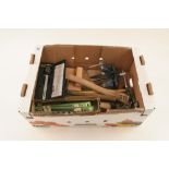 A box of tools including vice,