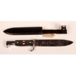 A Hitler Youth knife, the handle enamelled with swastikas, the blade engraved and with its