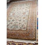A Persian style hand-knotted carpet, the