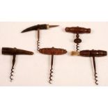 Five steel corkscrews, four with turned