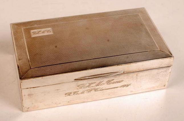 A George VI silver cigarette box of rect