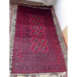 An Afghan rug, 183 x 90cm.