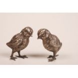 A pair of Victorian silver novelty peppe