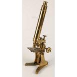 A brass microscope, af.