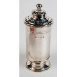 An Art Deco silver caster of cylindrical