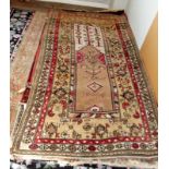 An eastern hand-knotted rug, the natural