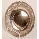 A late Victorian shallow silver bowl wit