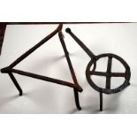 Two wrought iron trivets.