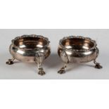 A pair of George II silver open salts wi