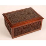 An arts and crafts walnut box, the lid c