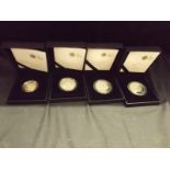 Three Crown size proof silver coins each