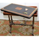 A high Victorian mahogany and birds eye maple fold top card table standing on four fluted supports