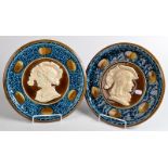 A pair of Austrian moulded majolica plaques in Renaissance style.