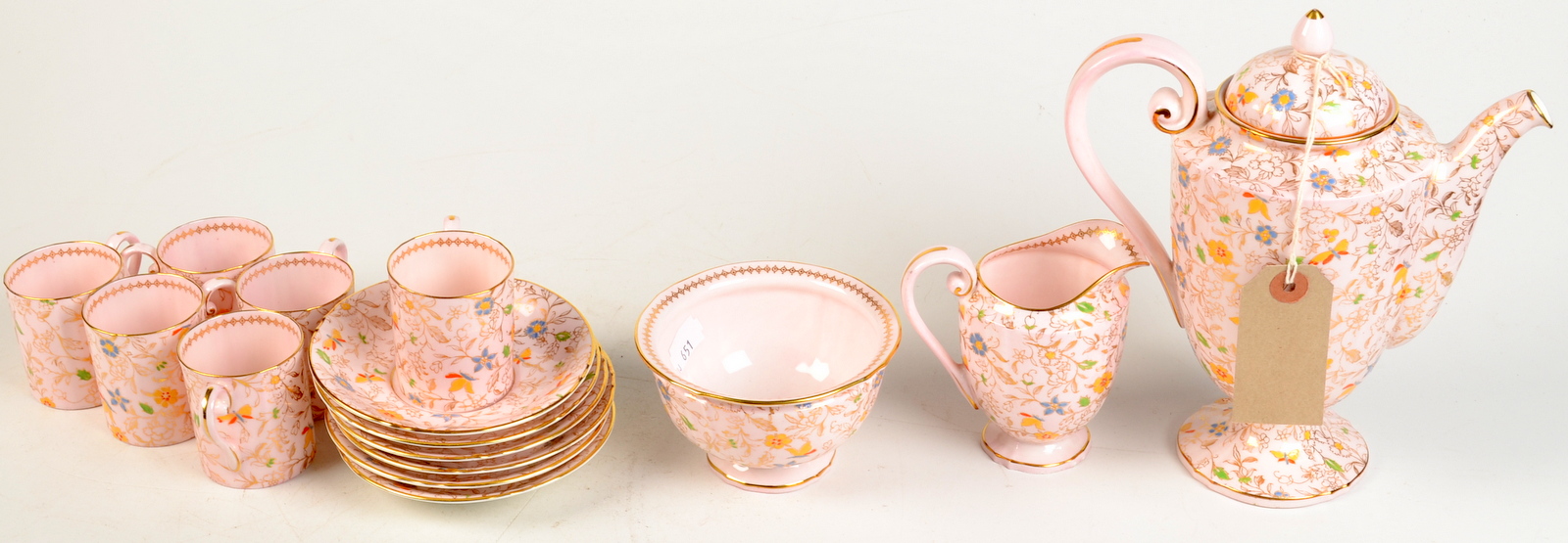 A pink ground Royal Worcester fifteen piece coffee service retailed by Asprey's.