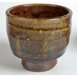 A stoneware studio pottery tea bowl.