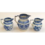 A pair of pearlware, early 19th century chinoiserie blue and white jugs and a third blue and white