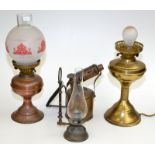 Three lamps and a brass blow lamp.