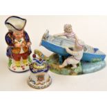 A continental porcelain model of two children launching a boat,