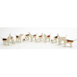 A pack of ten Beswick hounds in various poses. Condition Report: Good condition.