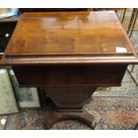 A Victorian walnut rosewood box on a square tapering pedestal with a quatrefoil base.