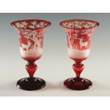 A pair of 19th century Bohemian red flash glass goblets,
