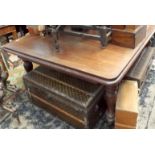 A Victorian mahogany extending dining table on four turned legs.  Length with both leaves