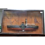 A half model of the paddle steamer Triton, Bristol in a glazed case.  Size of case 75.5 x 45cm.