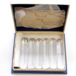 A set of six plain Daum glass knife rests, original box.  Condition Report: Some very minor