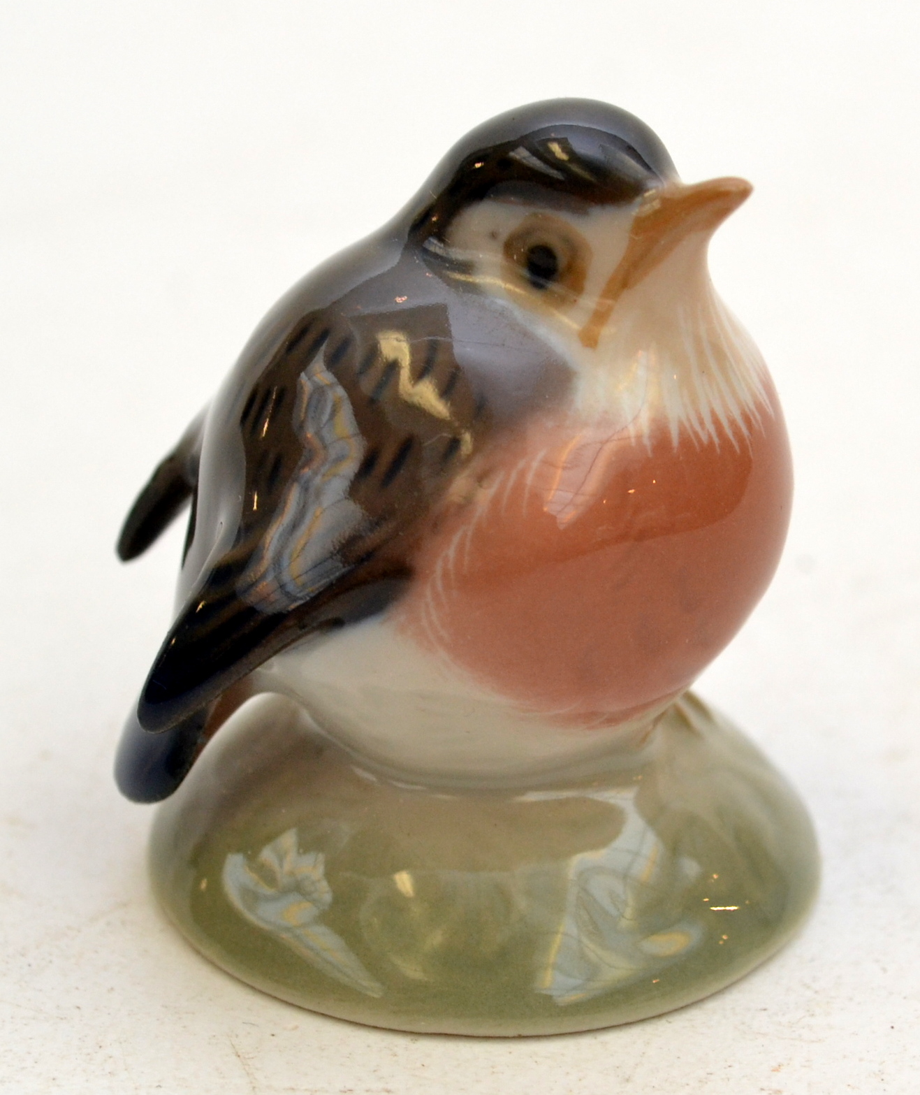 A Copenhagen small model of a robin, height 4.5cm.