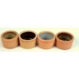 Four Leach stoneware cylindrical, small bowls.