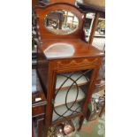 An Edwardian inlaid mahogany music cabinet with a mirror above a glazed door on square section