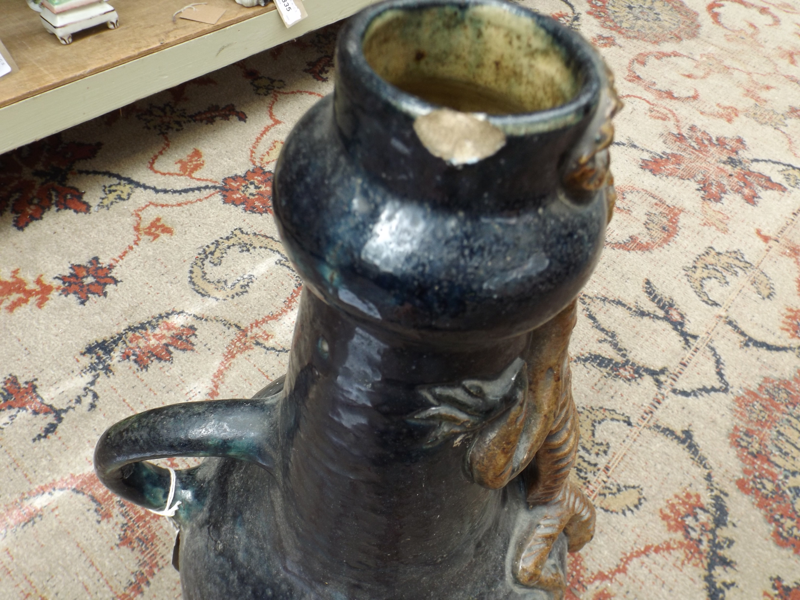 A collection of copper lustre and a continental art pottery jug.
 Condition Report: Jug not signed - Image 4 of 4
