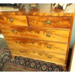 A George III mahogany veneered, straight front chest of two short and three long graduated,