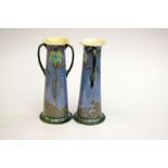 A pair of Minton Secessionist twin handled slightly tapering vases, model number 3536, with mottled,