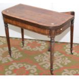 A Regency mahogany and crossbanded, bow front, fold top card table on turned,