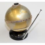 An "All Transistor" radio made as a globe with a tuning dial at the North Pole and an aerial handle,