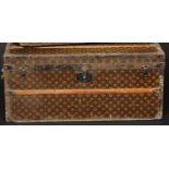 A Louis Vuitton cabin trunk, the interior label with addresses in Paris, Nice, Lille and London, and