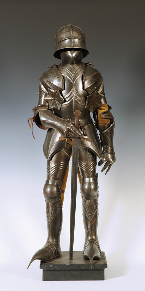 A fine Terry English replica of a 14th/15th century suit of armour with sword,