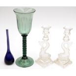 A tall green glass goblet,