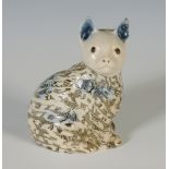 A mid-18th century solid agate seated cat the raised ears with under glazed blue, the eyes picked