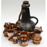 A collection of copper lustre and a continental art pottery jug.
 Condition Report: Jug not signed