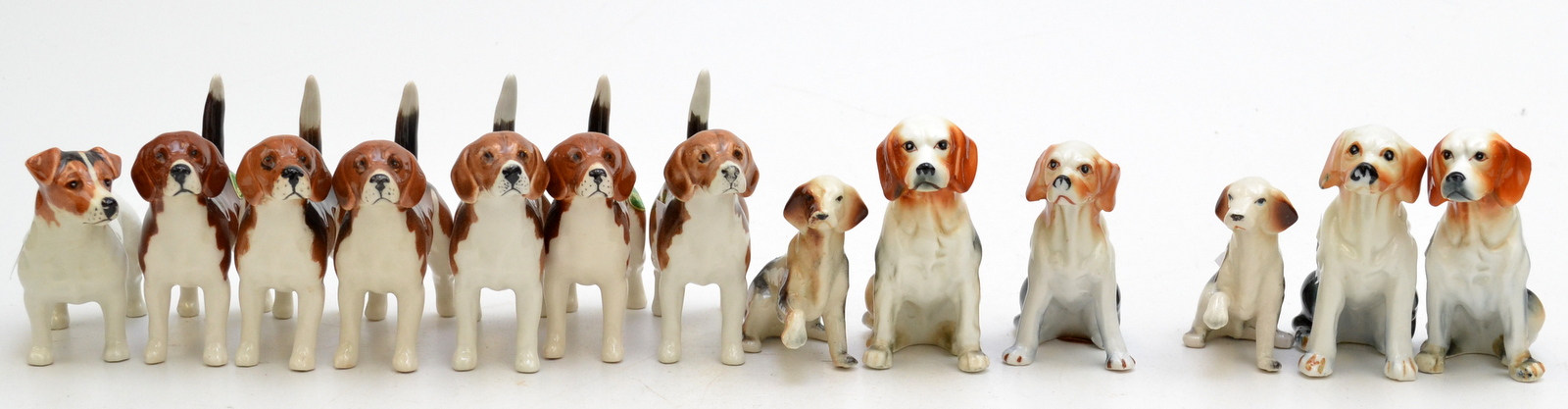 A pack of six Beswick Champion Wendover Billy hounds and a Beswick terrier, together with six