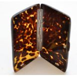 A 1930's tortoiseshell cigarette case.
 Condition Report: Size is 12.5cm x 8cm. Good condition other