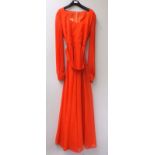 A vintage red polyester gown.