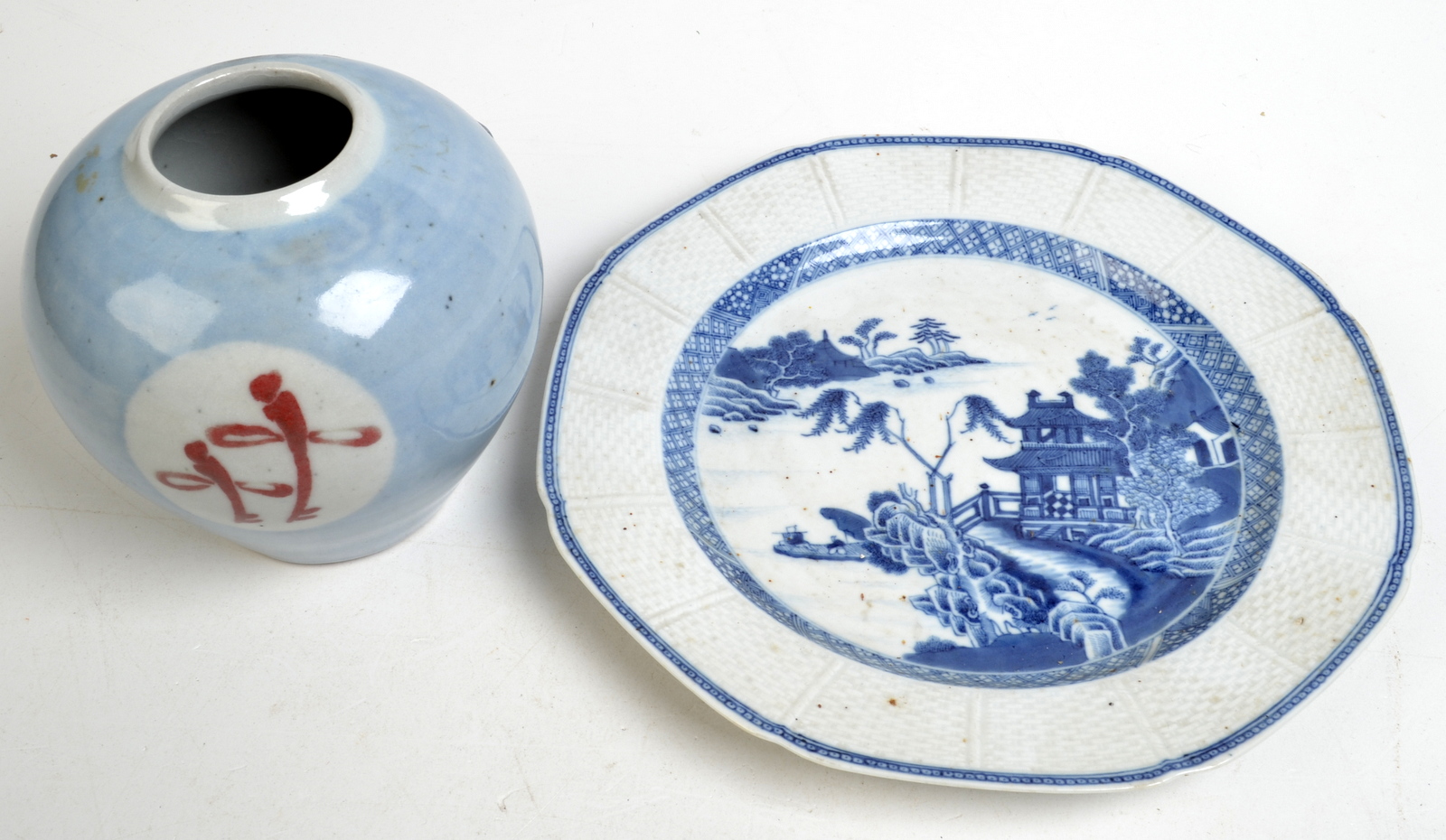 An 18th century Chinese, blue and white plate with basket weave border,