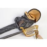 A Naval Officers' Elizabeth II sword by Wilkinson's Sword, complete with scabbard, sword knot and