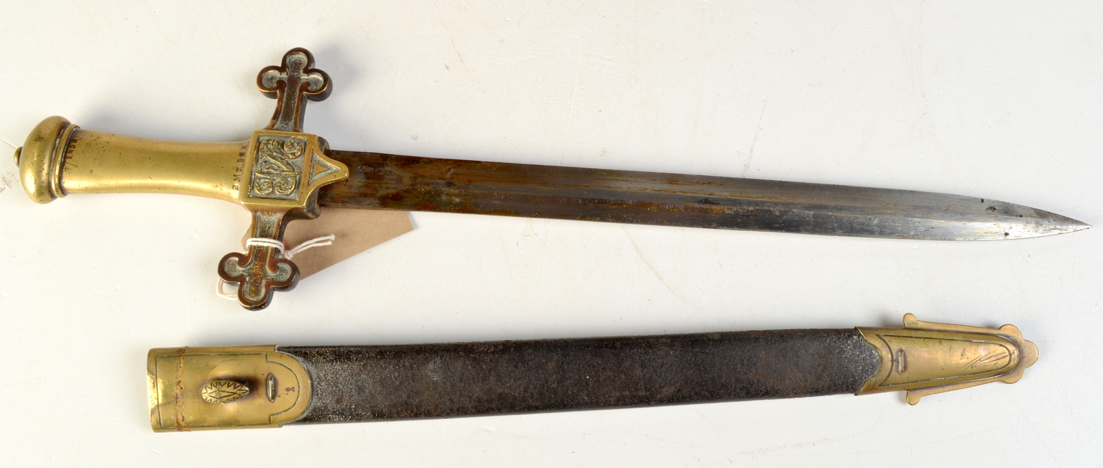 A late Victorian short sword with straight double edge blade the brass hilt dated 1898 V.