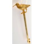 A 18ct. gold game bird brooch with diamond eye.