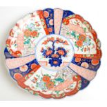 A Japanese Imari scalloped bowl.  Diameter 31.5cm.